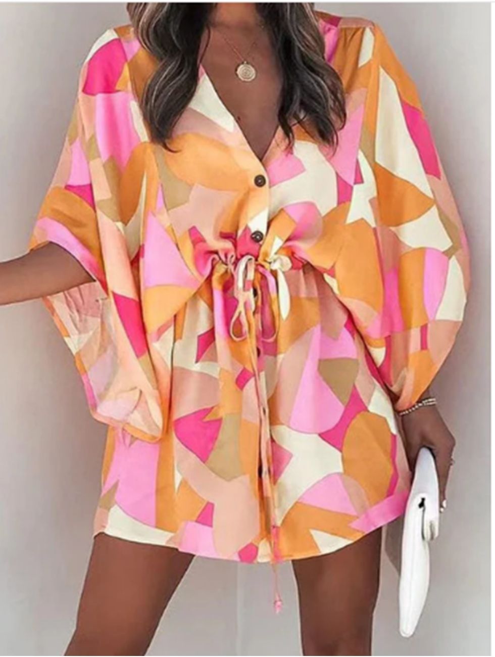 Length: Thigh-Length<br>
Material: Polyester<br>
Sleeve Type: Batwing Sleeve<br>
Neckline: V Neck<br>
Style: Vacation Wear<br>
Fit Style: Loose Fit



	
